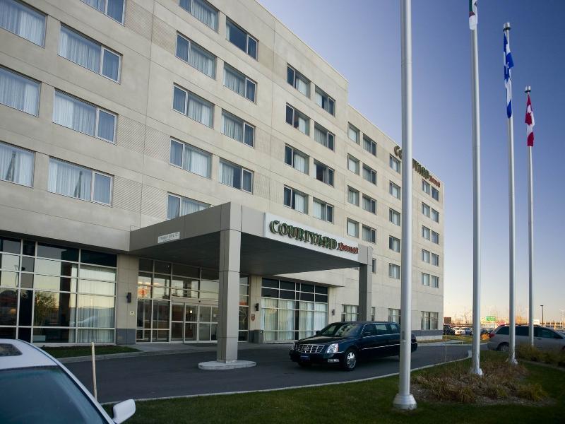 Отель Courtyard By Marriott Montreal Airport Дорваль Экстерьер фото