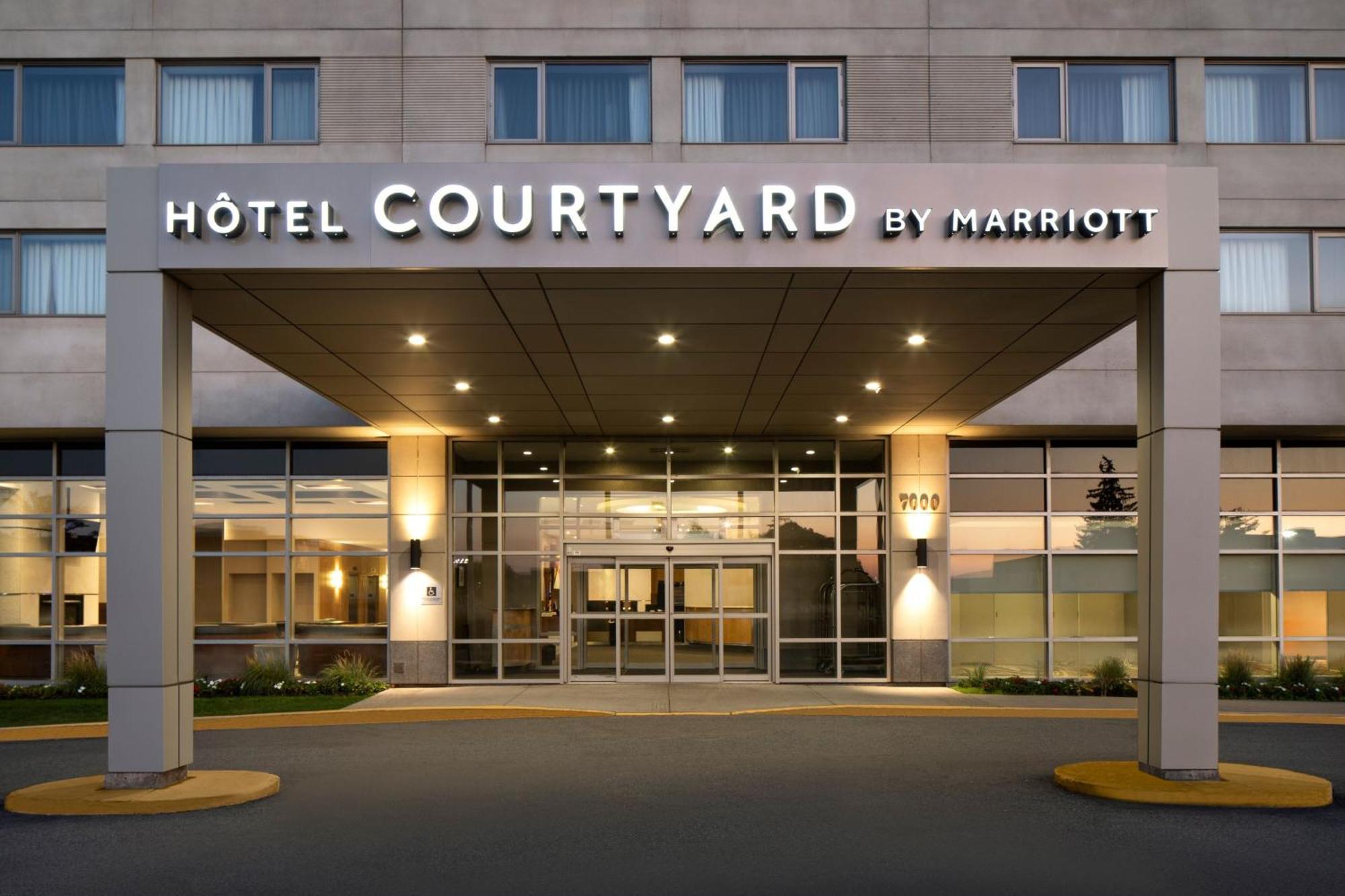 Отель Courtyard By Marriott Montreal Airport Дорваль Экстерьер фото